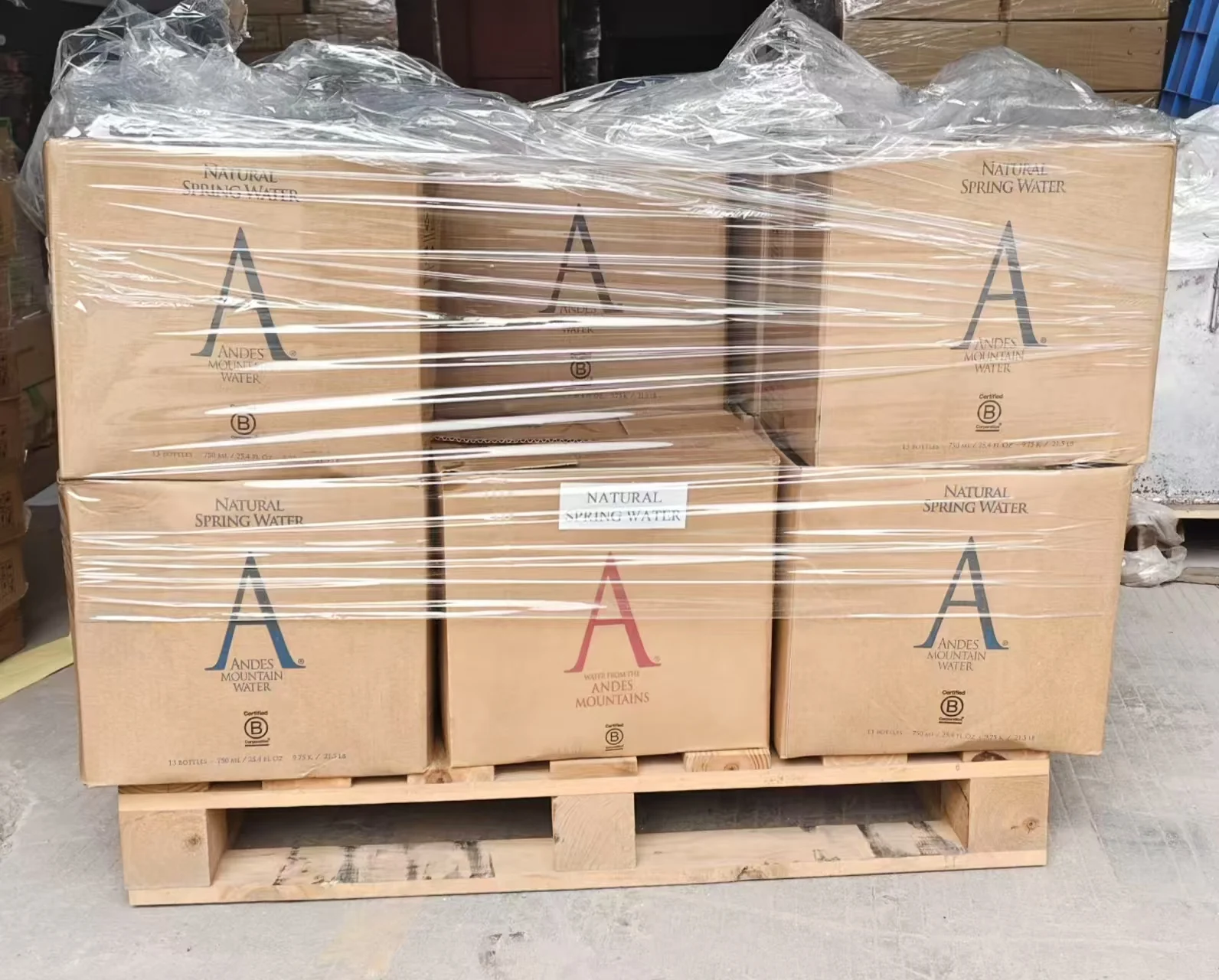 Used glass bottles packed and labelled for collection