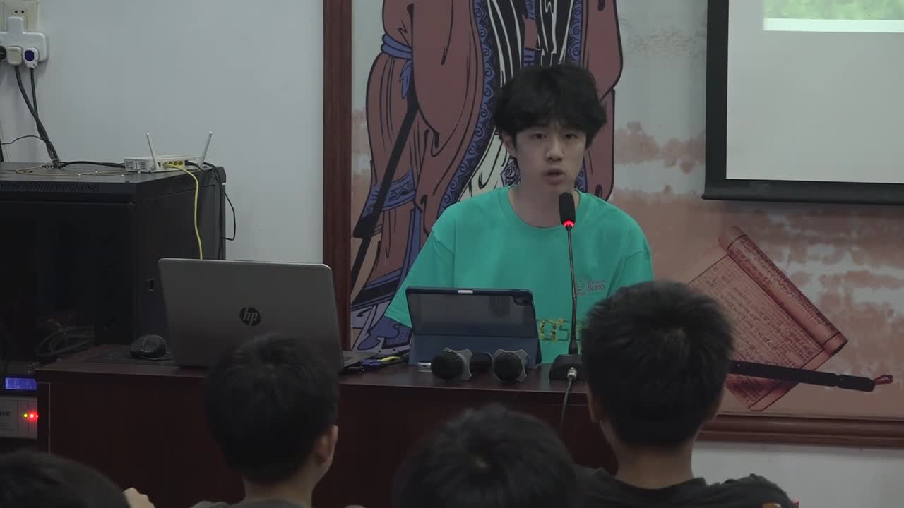 Silas presenting a glass recycling lesson at Huangcun Primary School